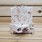 2 Blooming Rose Soap Bars on wood dish