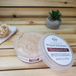 Chocolate Souffle Whipped Body Butter Next to Plant
