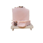 Pink soap on a white background
