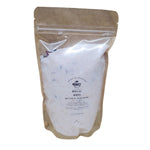 Kraft paper packaging of 'Royal Rose' botanical bath salts on a white background
