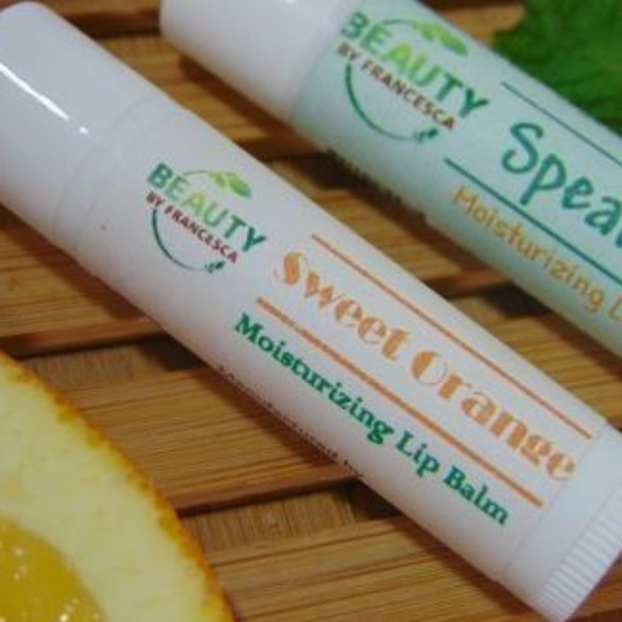 spearmint moisturizing lip balm and sweet orange moisurizing lip balm