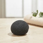 Bamboo charcoal konjac sponge, angled view