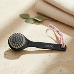 Black facial cleansing brush