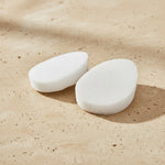 White facial sponges, angled view