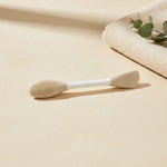 Double-ended silicone mask applicator in a spa setting