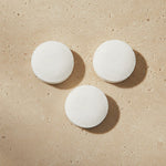 Three compressed face mask discs