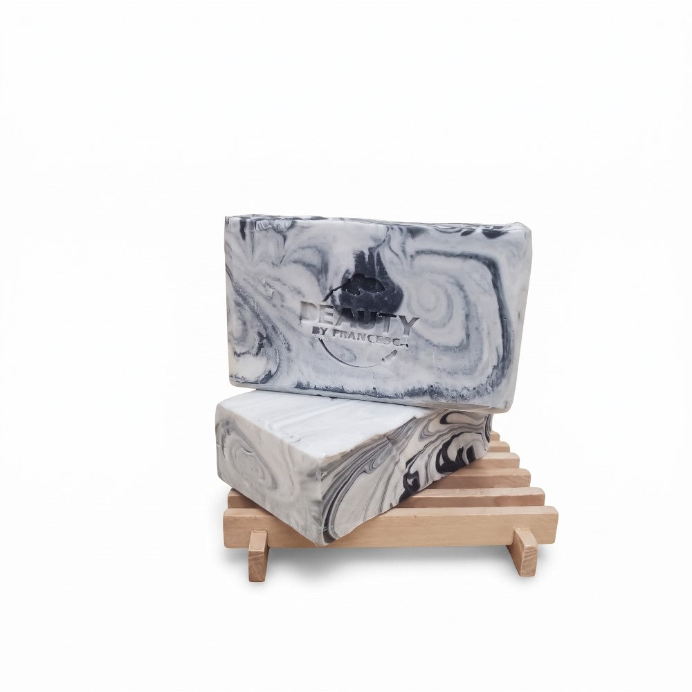 2 bars of Fire and Ice Soap on wood soap dish