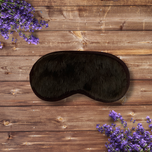 Faux Vegan Mink Sleep Mask next to lavender flowers