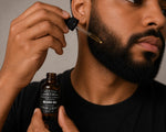 man applying Fragrance Free Beard Oil