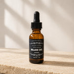 all natural beard oil  - ocean scent on beige stone