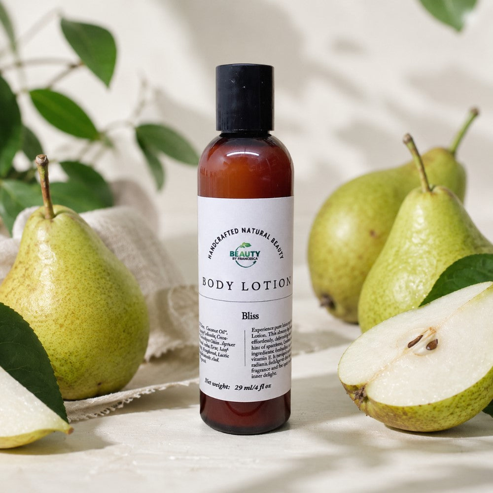 Bliss Body Lotion next to fresh pear slices
