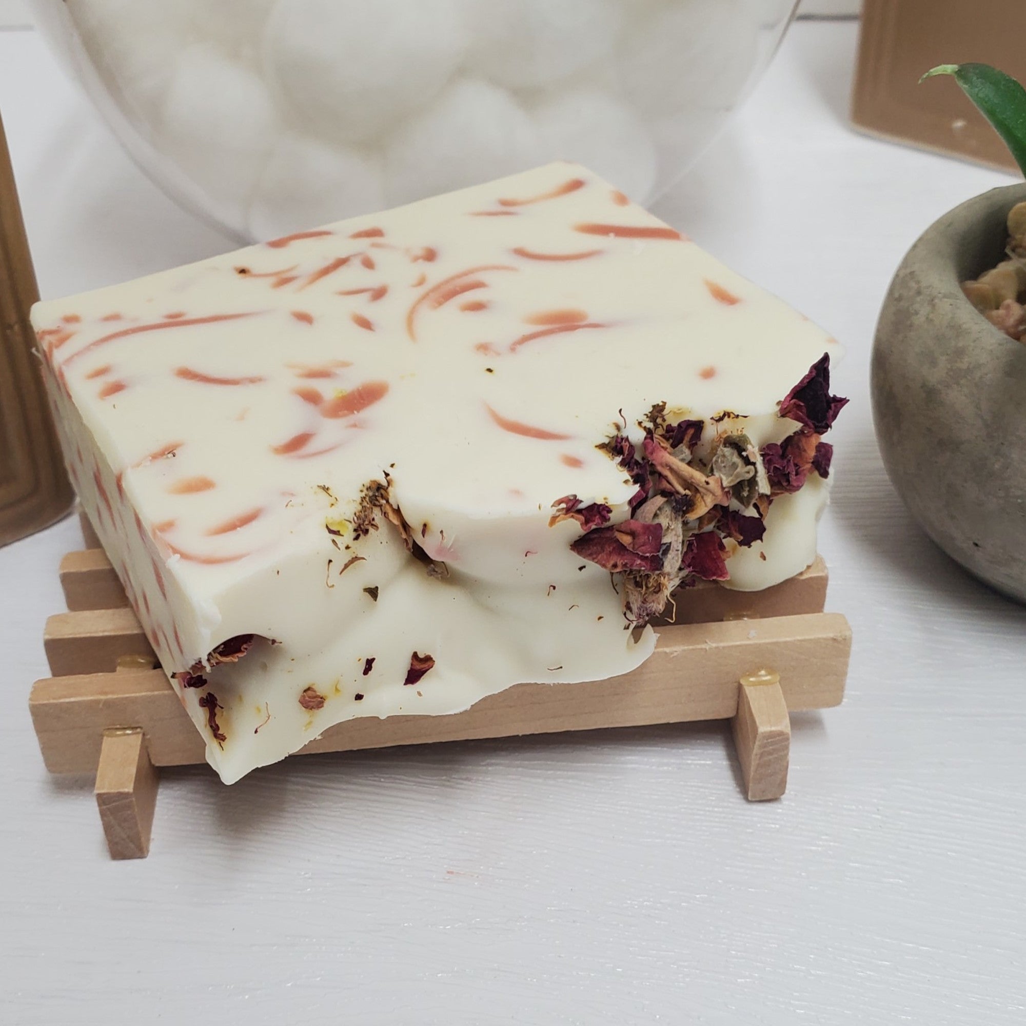 Blooming Rose handmade soap on wood soap dish angle view