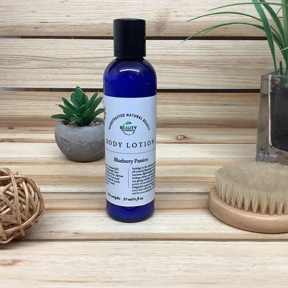 Blueberry Passion Body Lotion against wood background