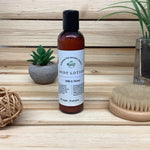 Milk & Honey Body Lotion against wood background