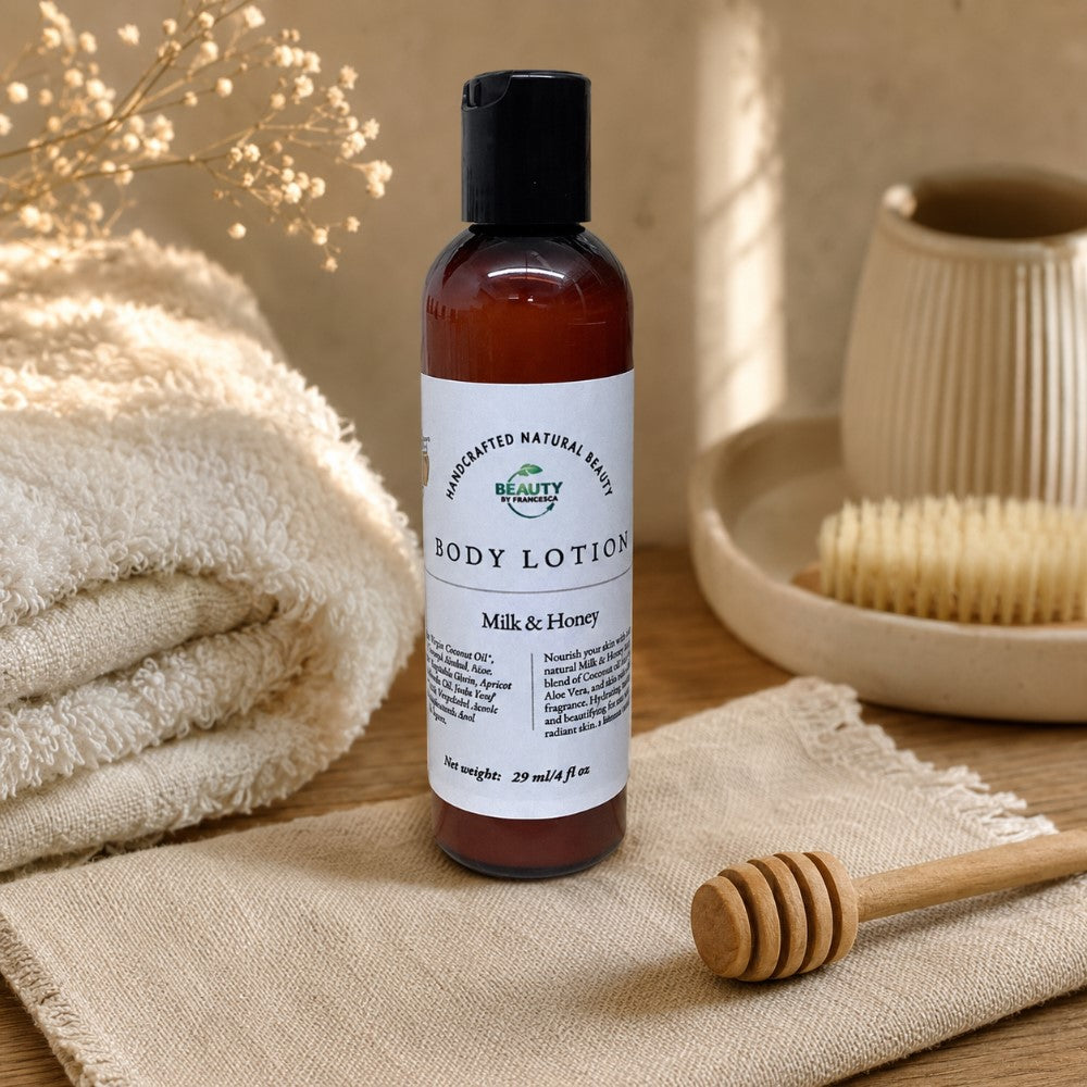 Milk and Honey Body Lotion on towel with honey stick