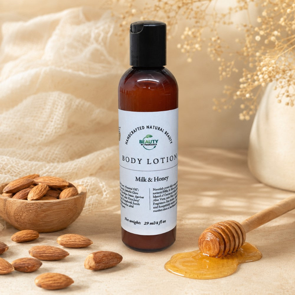 Milk and Honey Body Lotion next to a small bowl of almonds and a honey stick