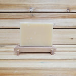 Sweet Cedarwood Soap front view on wood soap dish