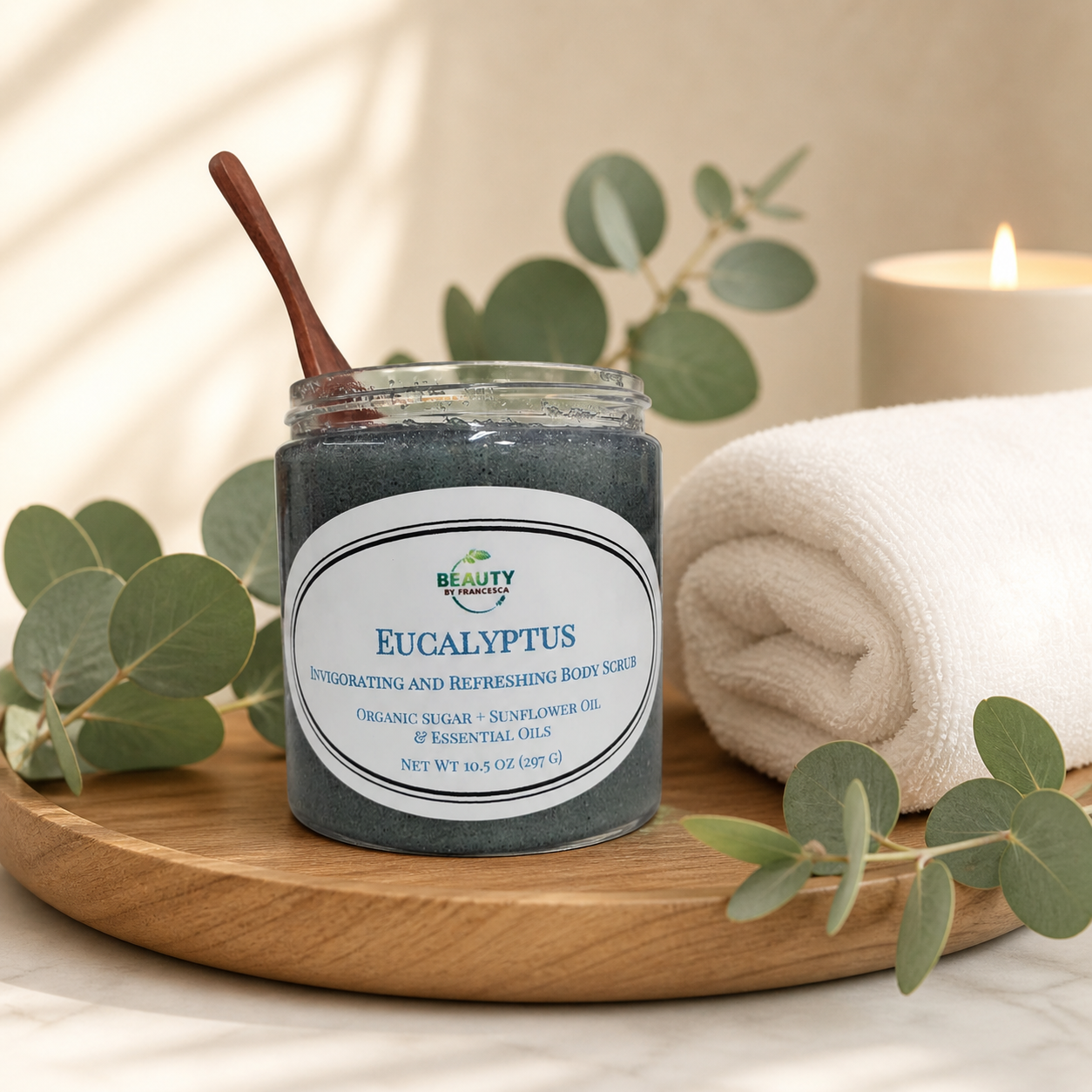 eucalyptus body scrub  on wood tray with eucalyptus