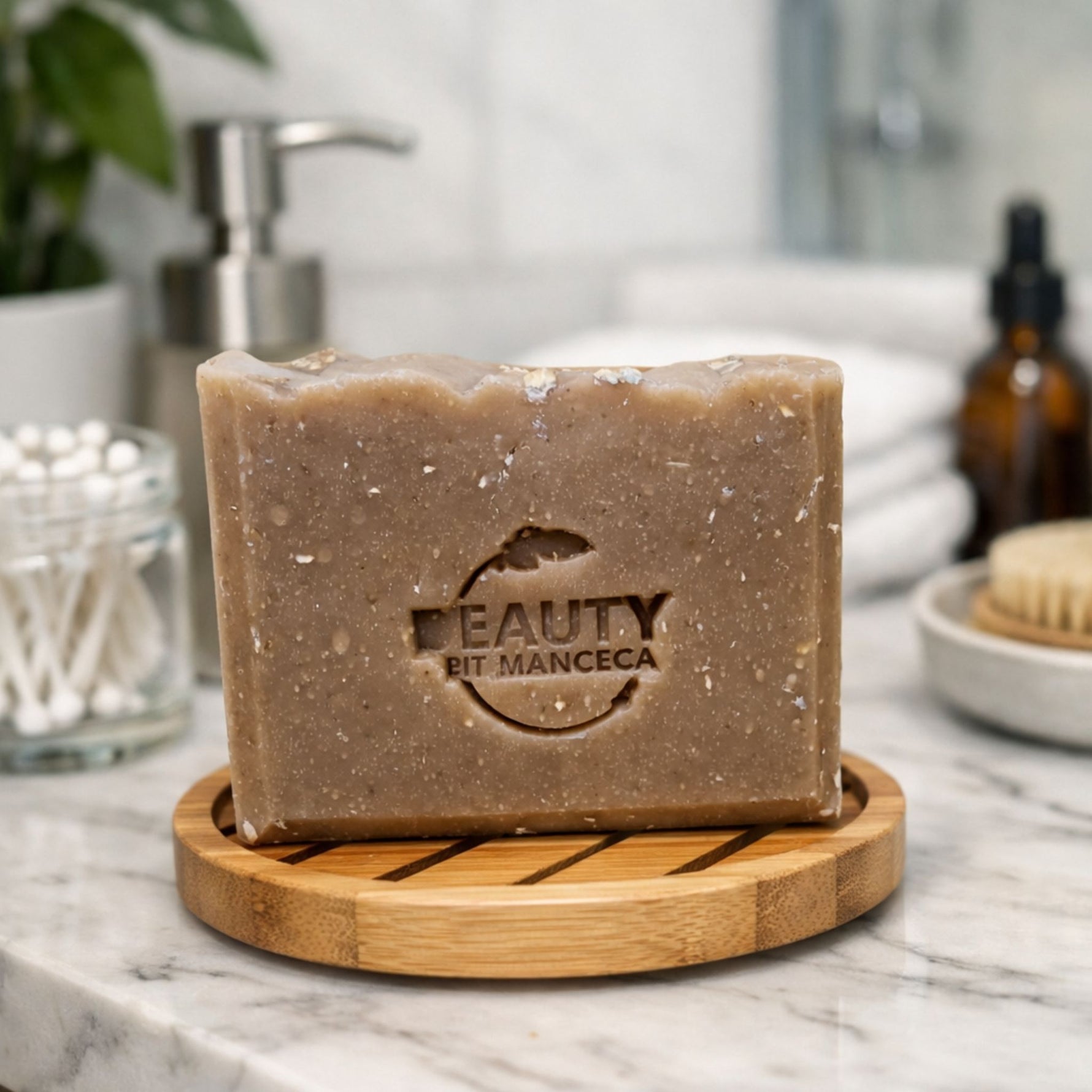 Bar of honey oatmeal chai soap with 'Beauty by Francesca ' branding on a wooden soap dish in a bathroom setting. 