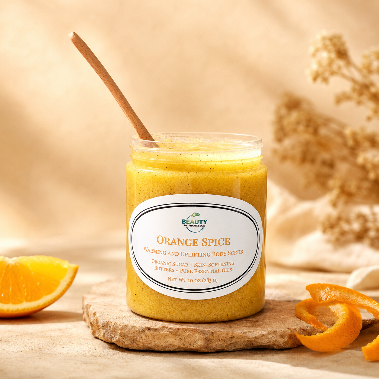 orange spice body scrub with orange slice and orange peels