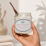 hand holding pink grapefruit whipped sea salt body scrub
