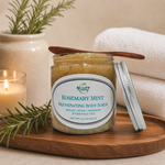 rosemary mint body scrub in spa setting with towels, candle and rosemary sprig