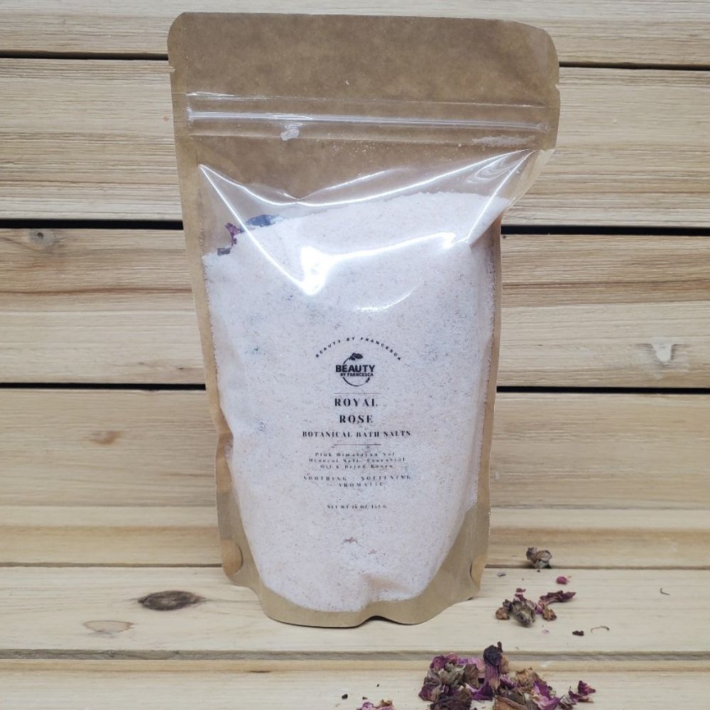 Bag of 'Royal Rose' botanical bath salts on a wooden surface