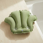 Back of terry bath pillow with four suction cups