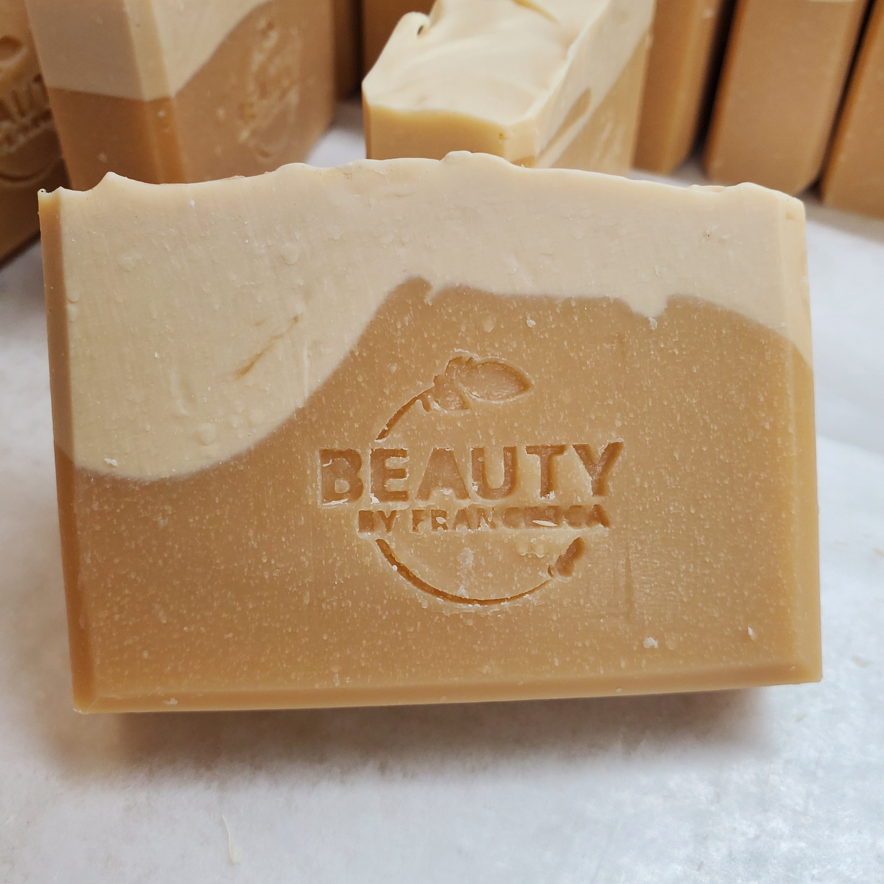Handmade Natural Beer Soap Bar - Pale Ale IPA close up with several bars in background