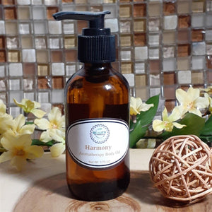 Harmony Aromatherapy Body Oil styled with flowers