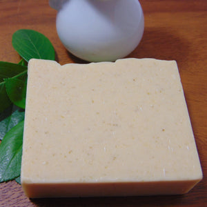 Goat's Milk Soap displayed with herbs