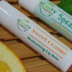 spearmint moisturizing lip balm and sweet orange moisurizing lip balm