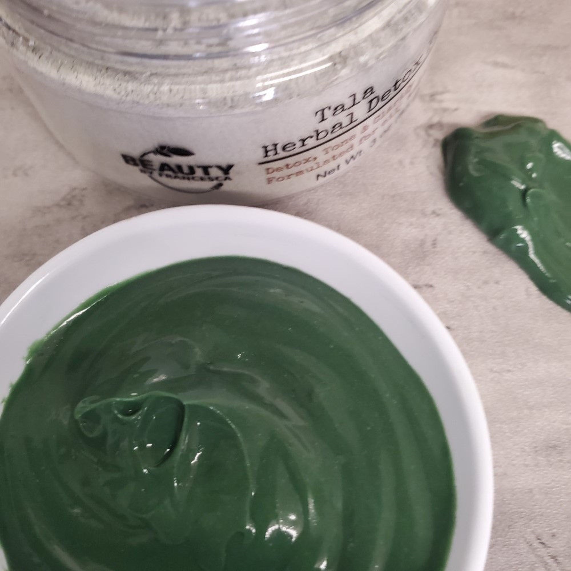 herbal detox face mask mixed in container