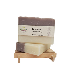 2 bars of lavender soap on wood soap saver