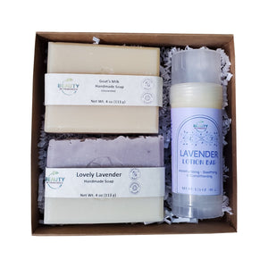 gift set with lavender soap,  goats milk soap and lavender lotion bar top open white background